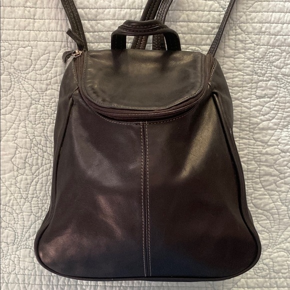 Tignanello Black Leather Backpack with Flap Closure and Sleek Design - Picture 1 of 9